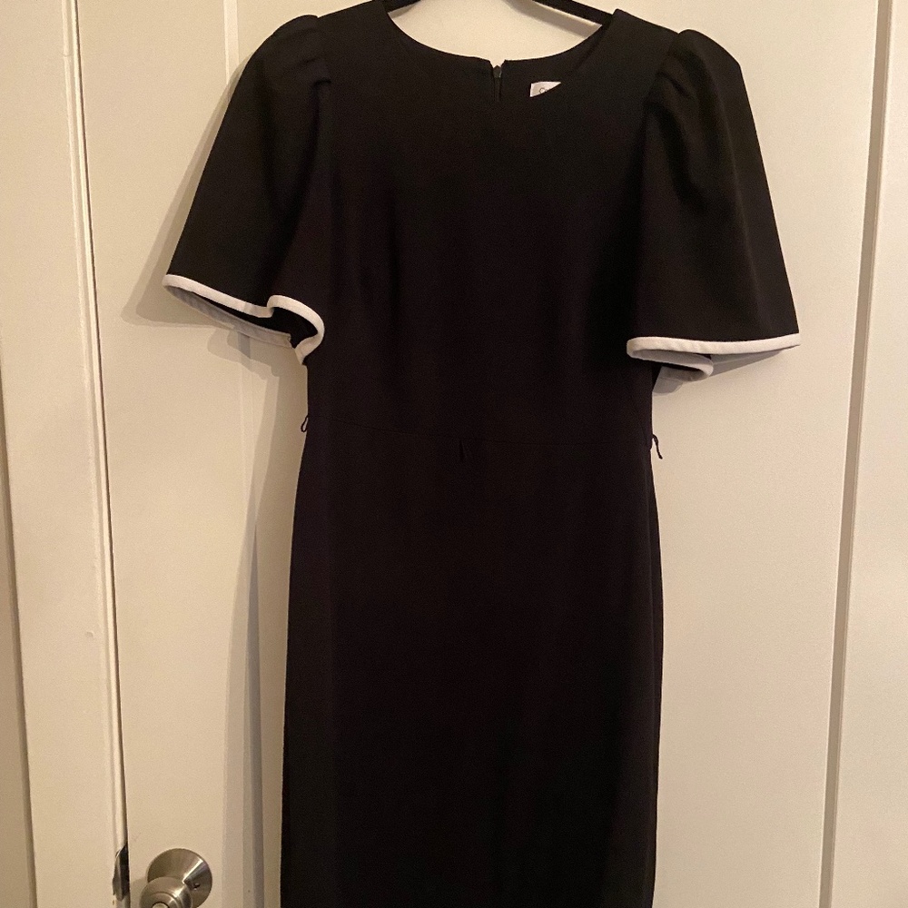 Calvin Klein black dress size 10 with white sleeve detailing. Like new.